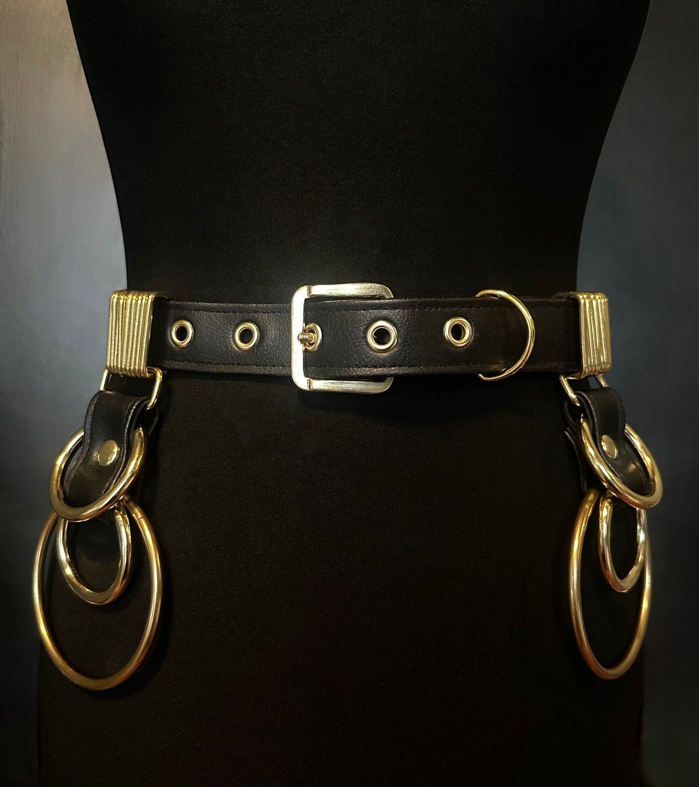black vegan leather waist cincher gothic belt goth corset o-rings black and gold harness 